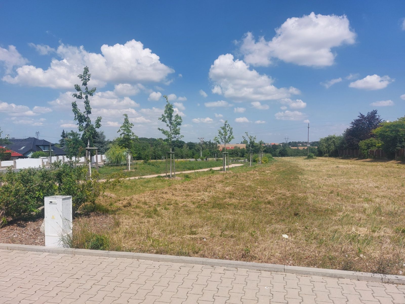 Prodej pozemku 877 m² — photo 2