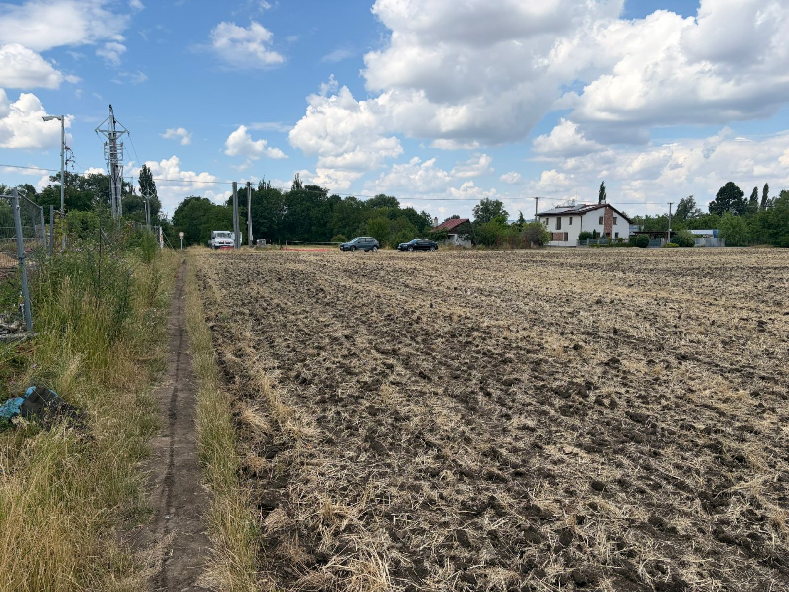 Prodej pozemku 1.077 m² — photo 3