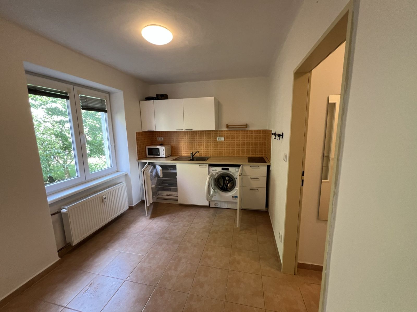 Pronájem bytu 1+1 32 m² — photo 2