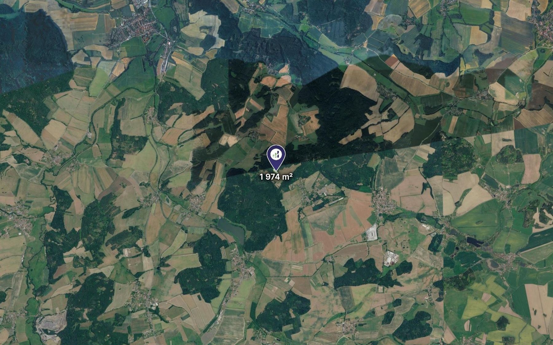 Prodej pozemku 1.974 m² — photo 2