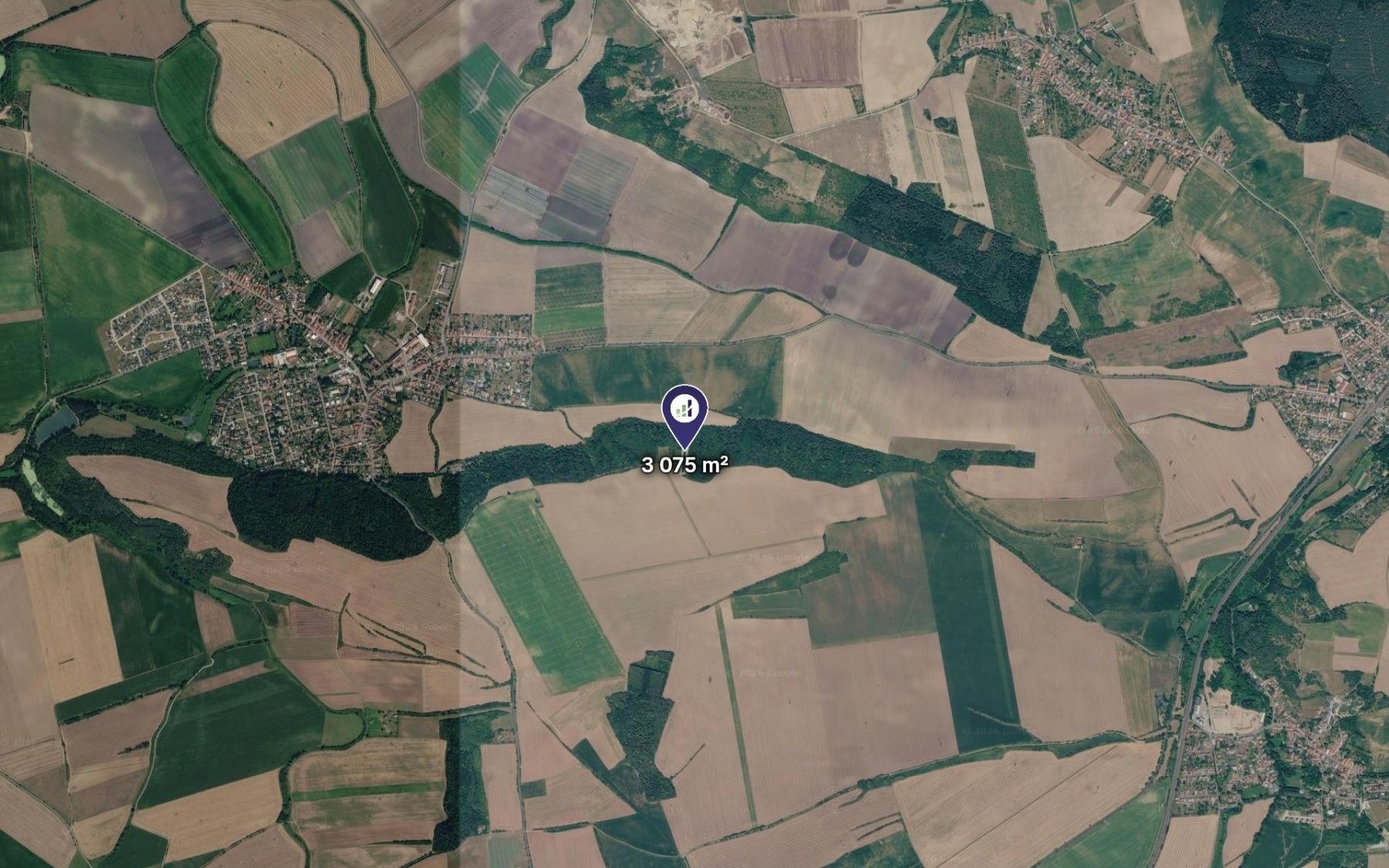 Prodej pozemku 3.075 m² – pohled 2