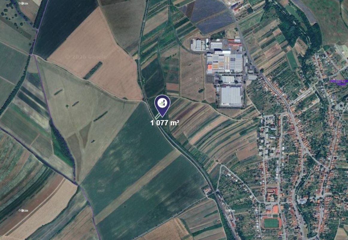 Prodej pozemku 1.077 m² — photo 2